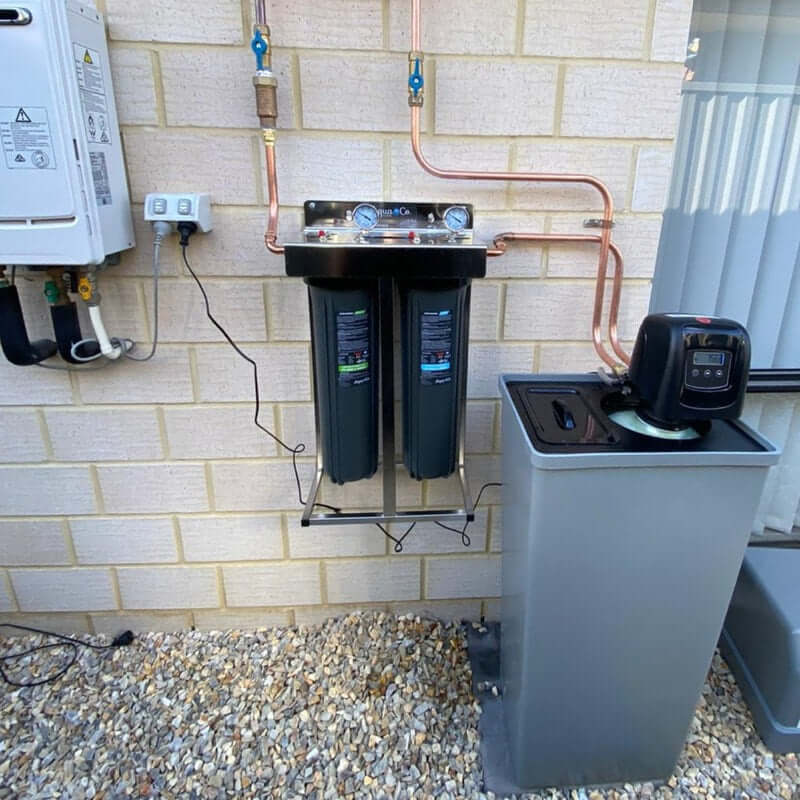 AquaCo-Water-Softener+Twin-Whole-House-Water-Filter-Combo classic installed outside covers removed