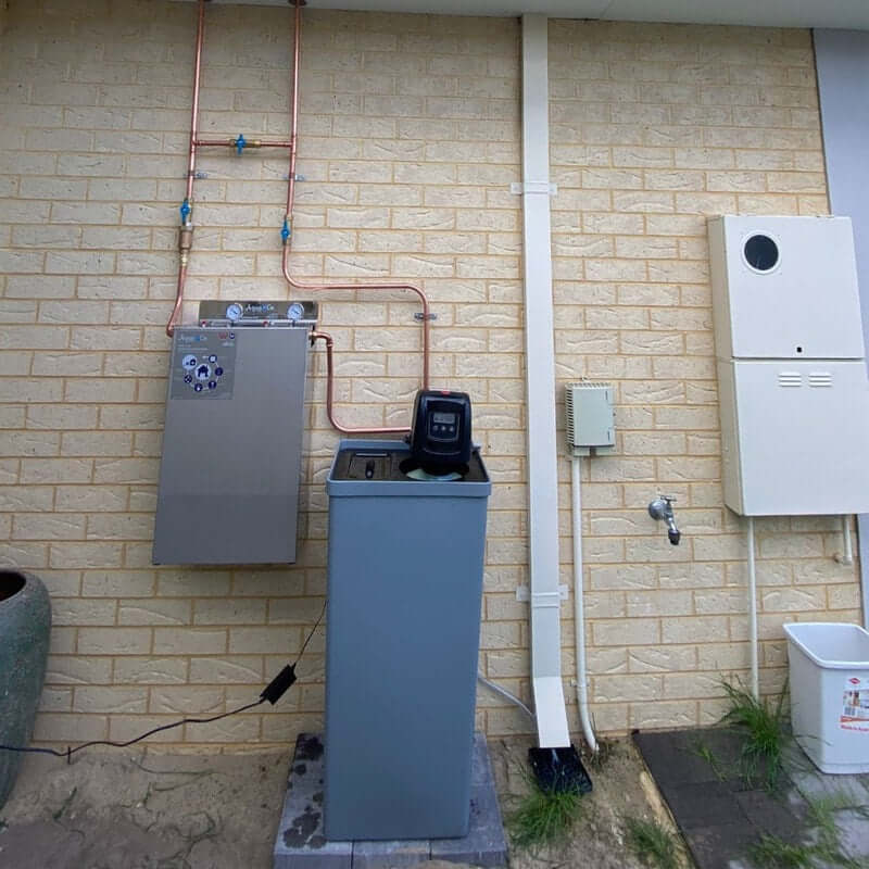 AquaCo-Water-Softener+Twin-Whole-House-Water-Filter-System Combo premium installation outside with cover removed